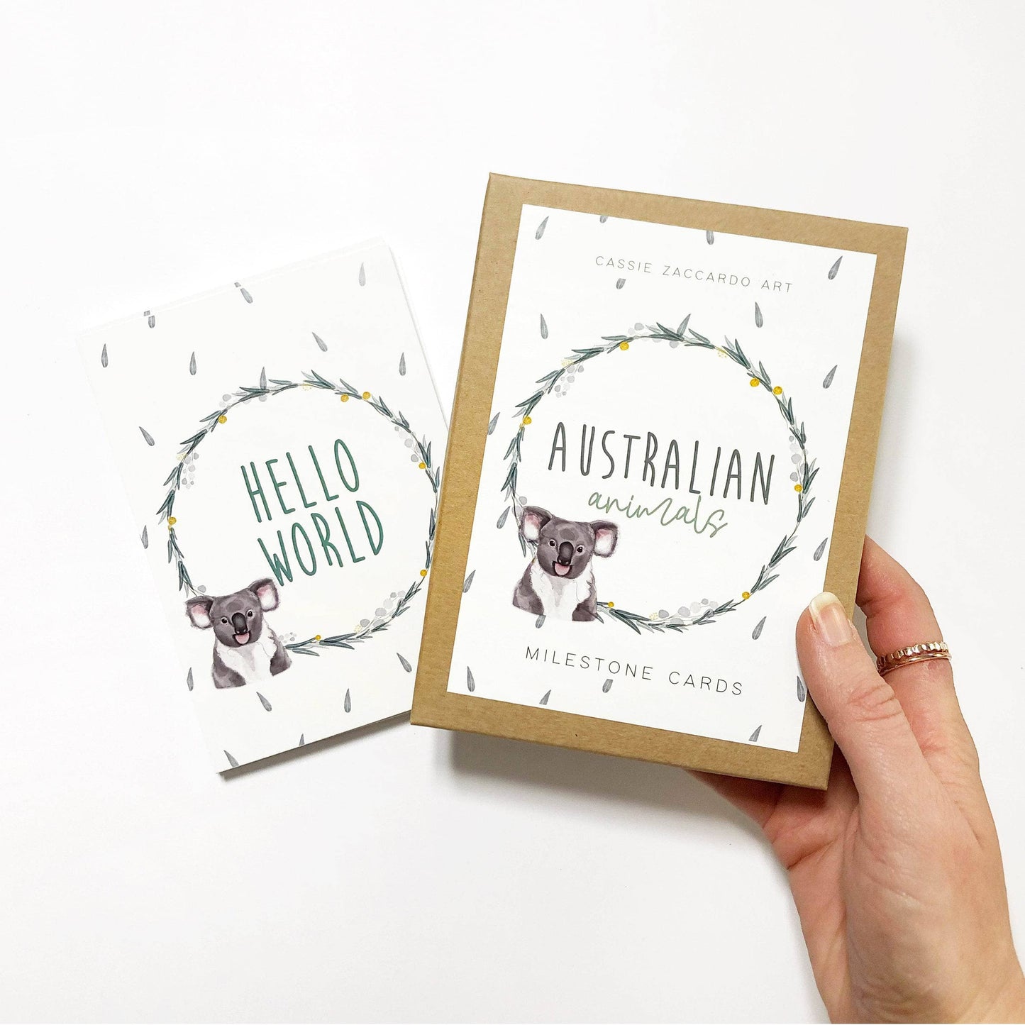 Australian Animals Baby Milestone Cards in hand