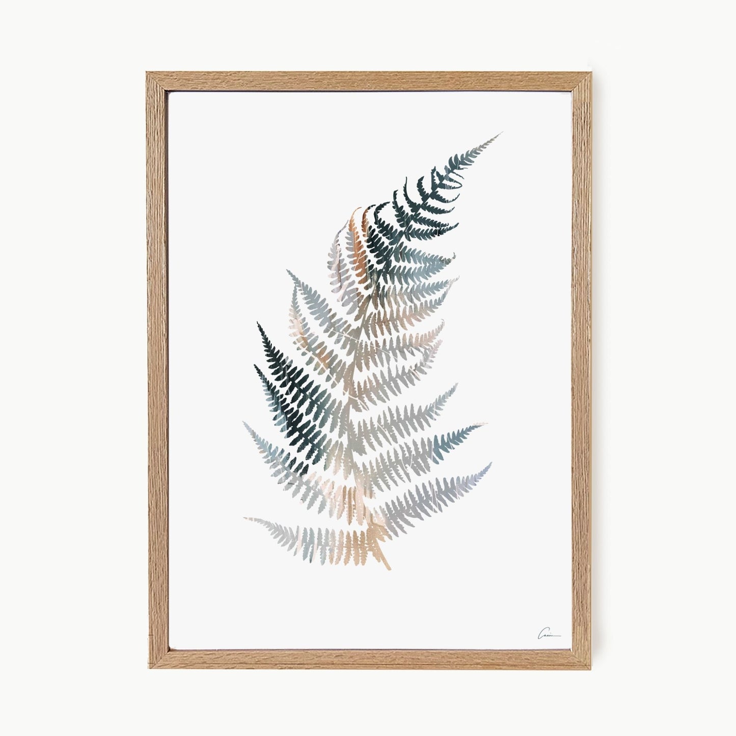 Framed artwork of a fern leaf with a wooden frame on a white background